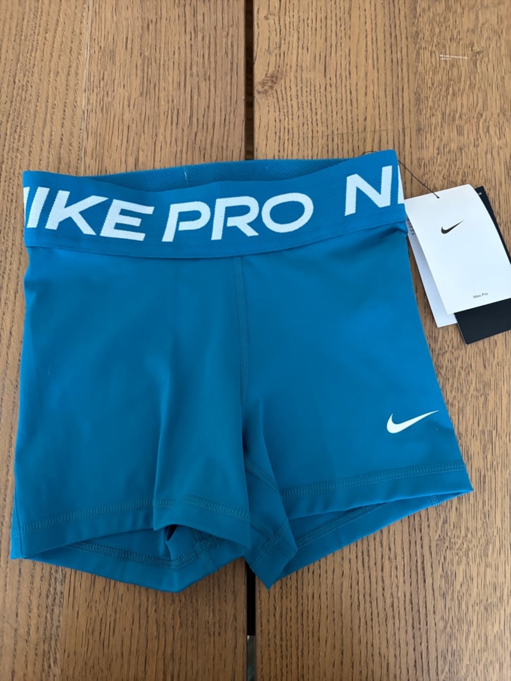 Nike Teal Athletic Compression Shorts with White Swoosh xxs women’s